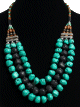 Collier ethnique artisanal imitation pierres turquoises noires et perles agence de pieces argentees ciselees